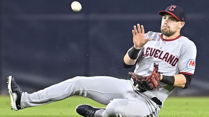 Mar 31, 2025; San Diego, California, USA; Cleveland Guardians outfielder Lane Thomas (8) makes a sliding catch on a ball hit by San Diego Padres second baseman Xander Bogaerts (not pictured) during the third inning at Petco Park. Mandatory Credit: Denis Poroy-Imagn Images Mar 31, 2025; San Diego, California, USA; Cleveland Guardians outfielder Lane Thomas (8) makes a sliding catch on a ball hit by San Diego Padres second baseman Xander Bogaerts (not pictured) during the third inning at Petco Park. Mandatory Credit: Denis Poroy-Imagn Images