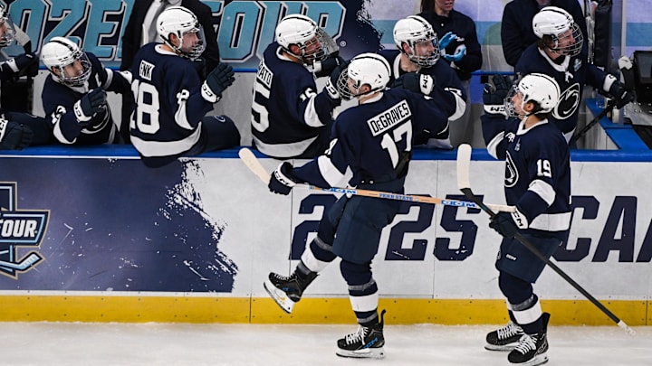Apr 10, 2025; St. Louis, Missouri, UNITED STATES; Penn State Nittany Lions forward Nicholas DeGraves (17) celebrates with teammates after scoring a goal against the Boston University Terriers during the third period of the Frozen Four college ice hockey national semifinals at Enterprise Center. Mandatory Credit: Connor Hamilton-Imagn Images Apr 10, 2025; St. Louis, Missouri, UNITED STATES; Penn State Nittany Lions forward Nicholas DeGraves (17) celebrates with teammates after scoring a goal against the Boston University Terriers during the third period of the Frozen Four college ice hockey national semifinals at Enterprise Center. Mandatory Credit: Connor Hamilton-Imagn Images