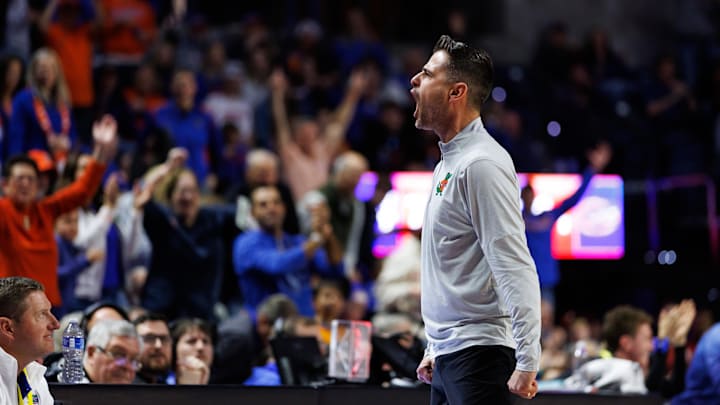 Florida Gators head coach Todd Golden reacts toward the crowd during the team's win over Alabama. Florida Gators head coach Todd Golden reacts toward the crowd during the team's win over Alabama.