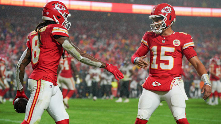 Nov 4, 2024; Kansas City, Missouri, USA; Kansas City Chiefs wide receiver DeAndre Hopkins (8) celebrates with quarterback Patrick Mahomes (15) after scoring against the Tampa Bay Buccaneers during the second half at GEHA Field at Arrowhead Stadium. Mandatory Credit: Denny Medley-Imagn Images