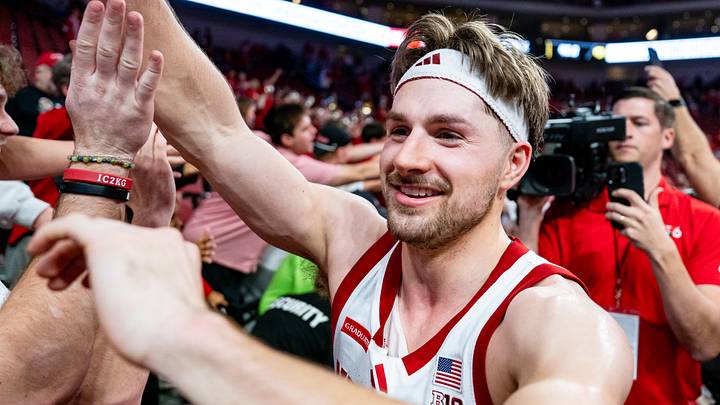 Sam Hoiberg high-fives fans after defeating the Iowa Hawkeyes at Pinnacle Bank Arena. Sam Hoiberg high-fives fans after defeating the Iowa Hawkeyes at Pinnacle Bank Arena.