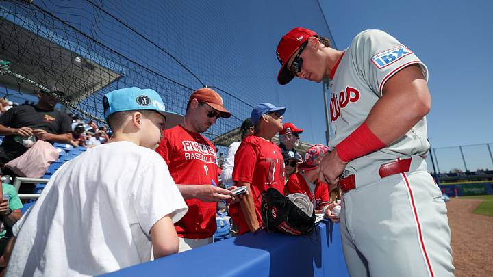 Mar 2, 2025; Dunedin, Florida, USA; Philadelphia Phillies infielder Aidan Miller (81) signs autographs for fans before a game against the Toronto Blue Jays during spring training at TD Ballpark. Mandatory Credit: Nathan Ray Seebeck-Imagn Images Mar 2, 2025; Dunedin, Florida, USA; Philadelphia Phillies infielder Aidan Miller (81) signs autographs for fans before a game against the Toronto Blue Jays during spring training at TD Ballpark. Mandatory Credit: Nathan Ray Seebeck-Imagn Images
