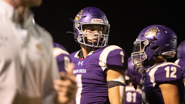 Bulldogs quarterback Tait Reynolds (1) at Queen Creek High School football field on Oct. 26, 2023.