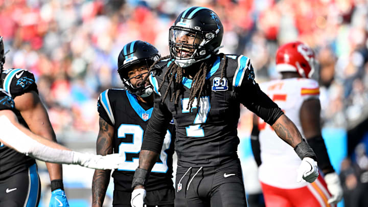 Nov 24, 2024; Charlotte, North Carolina, USA; Carolina Panthers linebacker Jadeveon Clowney (7) reacts after making a sack in the second quarter at Bank of America Stadium. 