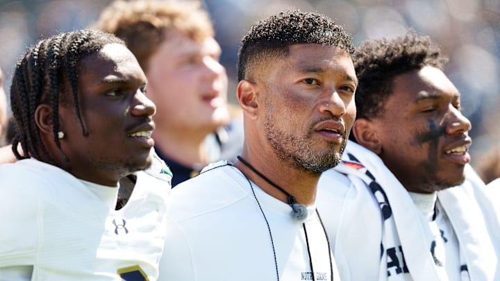 Notre Dame head coach Marcus Freeman, center, after the Blue-Gold spring game at Notre Dame Stadium on Saturday, April 25, 2026, in South Bend.