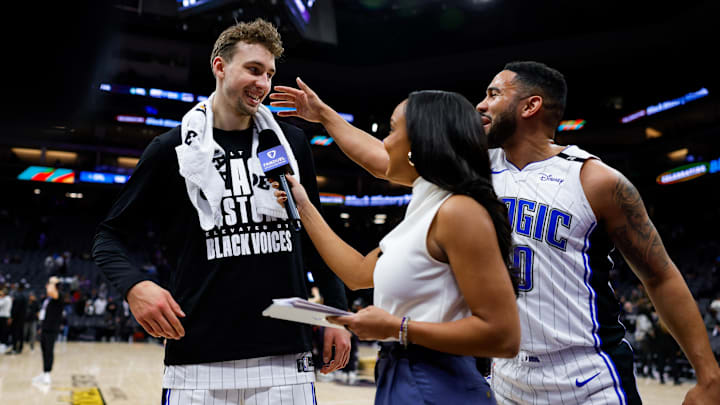 Orlando Magic guard Cory Joseph (10) touches forward Franz Wagner (22) during an interview after the game against the Sacramento Kings at Golden 1 Center. 