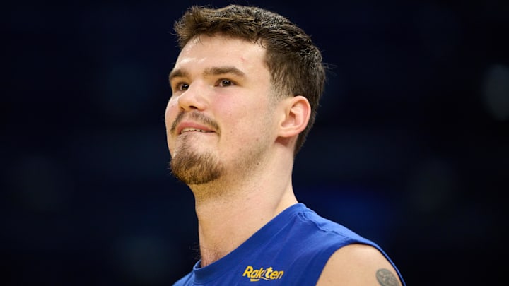 Dec 12, 2025; San Francisco, California, USA; Golden State Warriors center Quinten Post (21) looks on during warmups before the game against the Minnesota Timberwolves at Chase Center. Mandatory Credit: Robert Edwards-Imagn Images