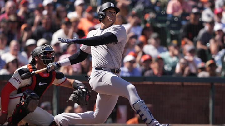 Jun 2, 2024; San Francisco, California, USA; New York Yankees right fielder Juan Soto (22) hits a home run against the San Francisco Giants during the ninth inning at Oracle Park. Mandatory Credit: Darren Yamashita-USA TODAY Sports