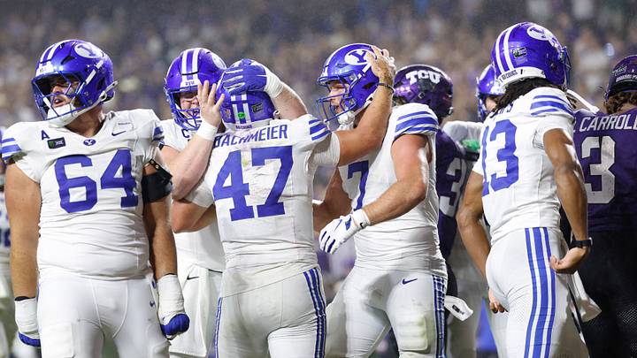 Oct 3, 2026; Fort Worth, Texas, USA;  BYU Cougars quarterback Bear Bachmeier (47) celebrates with teammates after scoring a touchdown against the TCU Horned Frogs during the first half at Amon G. Carter Stadium.  Mandatory Credit: Chris Jones-Imagn Images