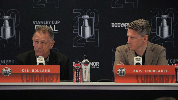 Jun 7, 2024; Sunrise, Florida, USA; Edmonton Oilers general manager Ken Holland, left, and head coach Kris Knoblauch take questions during media day in advance of the 2024 Stanley Cup Final at Amerant Bank Arena. Mandatory Credit: Jim Rassol-Imagn Images