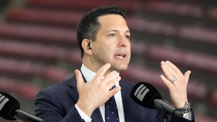 Jan 8, 2024; Houston, TX, USA; Adam Schefter talks on a set before the 2024 College Football Playoff national championship game between the Michigan Wolverines and the Washington Huskies at NRG Stadium. Mandatory Credit: Kirby Lee-Imagn Images Jan 8, 2024; Houston, TX, USA; Adam Schefter talks on a set before the 2024 College Football Playoff national championship game between the Michigan Wolverines and the Washington Huskies at NRG Stadium. Mandatory Credit: Kirby Lee-Imagn Images