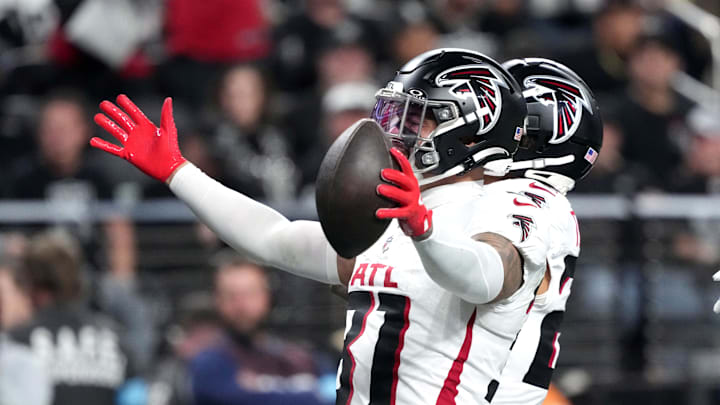 Dec 16, 2024; Paradise, Nevada, USA; Atlanta Falcons safety Justin Simmons (31) celebrates after intercepting a pass against the Las Vegas Raiders in the second half at Allegiant Stadium. Mandatory Credit: Kirby Lee-Imagn Images