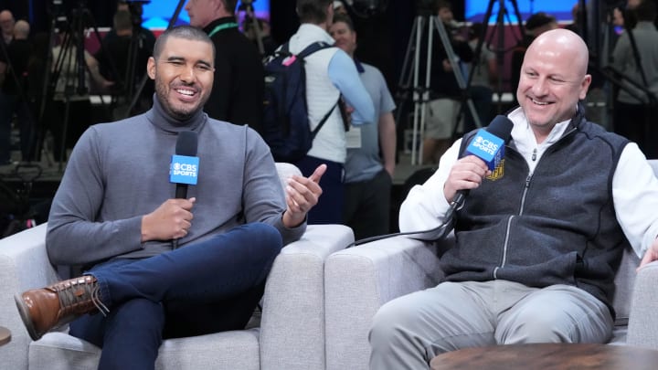 Feb 27, 2024; Indianapolis, IN, USA; CBS Sports lead insider reporter Jonathan Jones (left) with Los Angeles Chargers general manager Joe Hortiz.