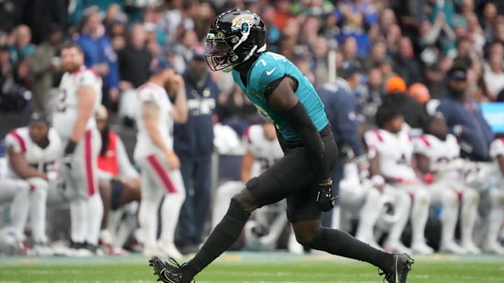 Oct 20, 2024; London, United Kingdom; Jacksonville Jaguars wide receiver Brian Thomas Jr. (7) celebrates after catching a 58-yard pass against New England Patriots cornerback Christian Gonzalez (0) in the first half of an NFL International Series game at Wembley Stadium. Mandatory Credit: Kirby Lee-Imagn Images