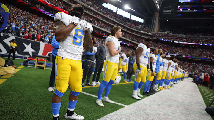 Los Angeles Chargers linebacker Denzel Perryman reacts to the national anthem before playing against the Houston Texans.