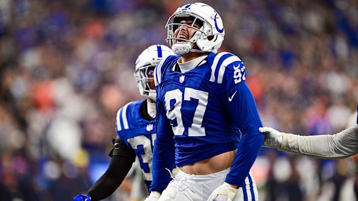 Sep 22, 2024; Indianapolis, Indiana, USA; Indianapolis Colts defensive end Laiatu Latu (97) celebrates a sack during the second half against the Chicago Bears at Lucas Oil Stadium. Mandatory Credit: Marc Lebryk-Imagn Images

