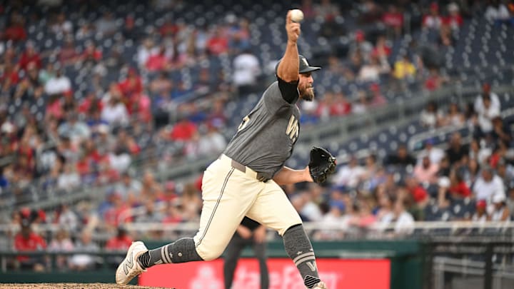 Aug 31, 2024; Washington, District of Columbia, USA; Washington Nationals relief pitcher Tanner Rainey (21) throws against the Chicago Cubs during the ninth inning at Nationals Park. 