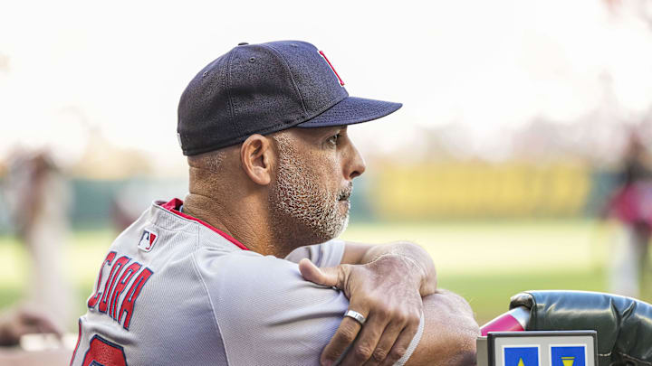 May 30, 2025; Cumberland, Georgia, USA; Boston Red Sox manager Alex Cora (13) in the dugout against the Atlanta Braves during the first inning at Truist Park. Mandatory Credit: Dale Zanine-Imagn Images