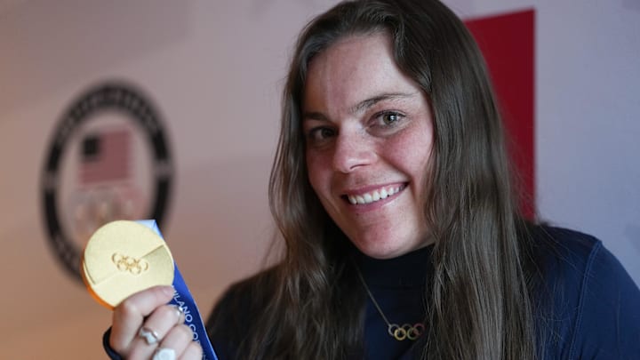 Feb 9, 2026; Cortina d'Ampezzo, Italy; United States skier Breezy Johnson poses for a photo with her gold medal during the Milano Cortina 2026 Olympic Winter Games at Hotel Tofana Cortina.