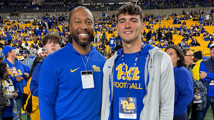 Peters Township LB Reston Lehman pictured with Pitt football legend Larry Fitzgerald