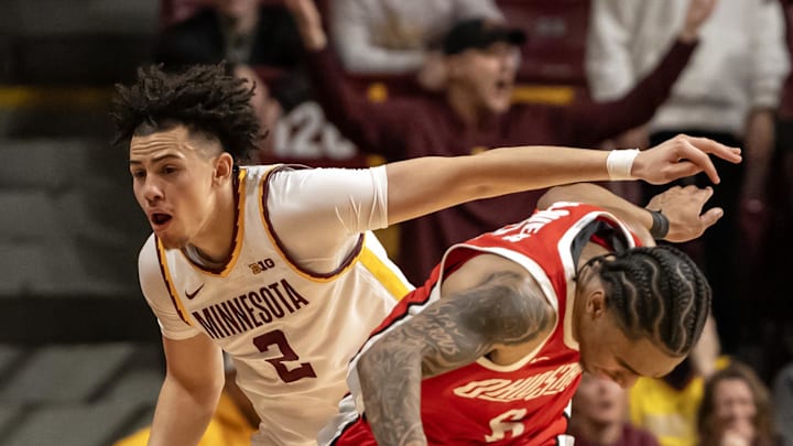 Jan 6, 2025; Minneapolis, Minnesota, USA; Ohio State Buckeyes guard Ques Glover (6) is fouled by Minnesota Golden Gophers guard Mike Mitchell Jr. (2) during the second overtime at Williams Arena. Mandatory Credit: Nick Wosika-Imagn Images Jan 6, 2025; Minneapolis, Minnesota, USA; Ohio State Buckeyes guard Ques Glover (6) is fouled by Minnesota Golden Gophers guard Mike Mitchell Jr. (2) during the second overtime at Williams Arena. Mandatory Credit: Nick Wosika-Imagn Images