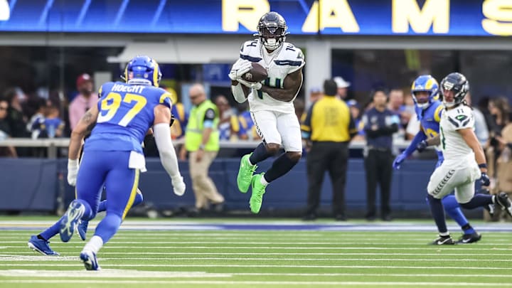 Jan 5, 2025; Inglewood, California, USA;  Seattle Seahawks DK Metcalf (14) catches a reception in the 2nd quarter versus the Los Angeles Rams at SoFi Stadium. Mandatory Credit: William Navarro-Imagn Images