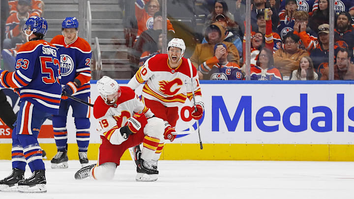 Calgary Flames Jonathan Huberdeau (10) celebrate a goal scored by forward Antony Mantha (39) during the third period against the Edmonton Oilers