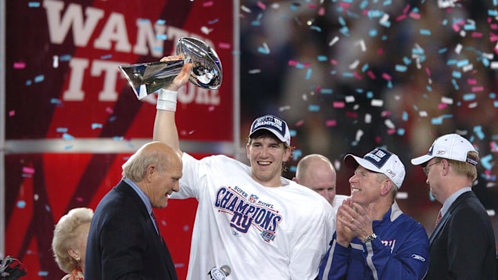 Eli Manning holds the trophy after Super Bowl XLII. Eli Manning holds the trophy after Super Bowl XLII.