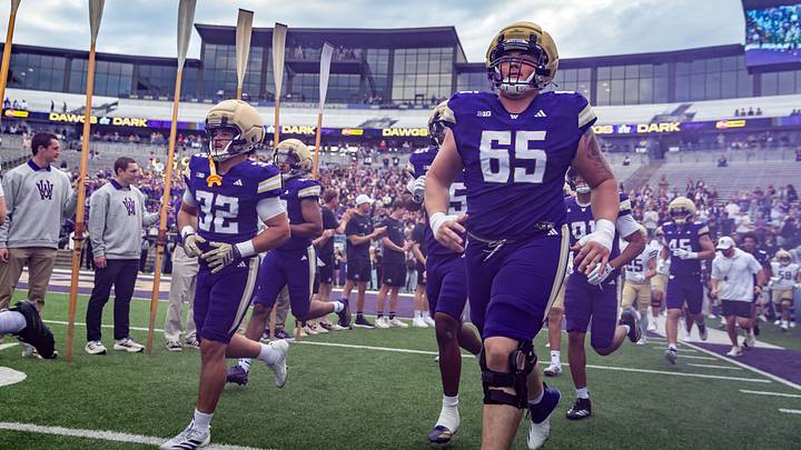 Jack Shaffer runs onto the field for the Spring Game.