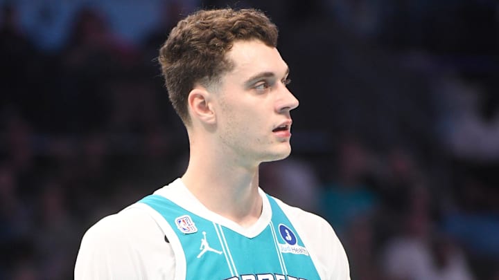 Oct 22, 2025; Charlotte, North Carolina, USA;  Charlotte Hornets center Ryan Kalkbrenner (11) during the first half against the Brooklyn Nets at the Spectrum Center. Mandatory Credit: Sam Sharpe-Imagn Images