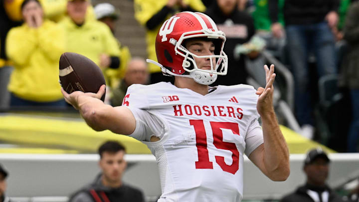 Oct 11, 2025; Eugene, Oregon, USA; Indiana Hoosiers quarterback Fernando Mendoza (15) throws a pass against the Oregon Ducks during the second quarter at Autzen Stadium. Mandatory Credit: Troy Wayrynen-Imagn Images Oct 11, 2025; Eugene, Oregon, USA; Indiana Hoosiers quarterback Fernando Mendoza (15) throws a pass against the Oregon Ducks during the second quarter at Autzen Stadium. Mandatory Credit: Troy Wayrynen-Imagn Images