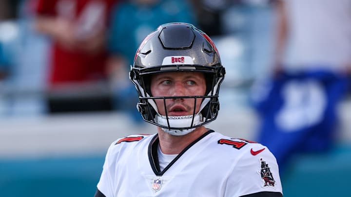 Aug 17, 2024; Jacksonville, Florida, USA; Tampa Bay Buccaneers quarterback John Wolford (11) warms up before a preseason game against the Jacksonville Jaguars at EverBank Stadium. Mandatory Credit: Nathan Ray Seebeck-Imagn Images