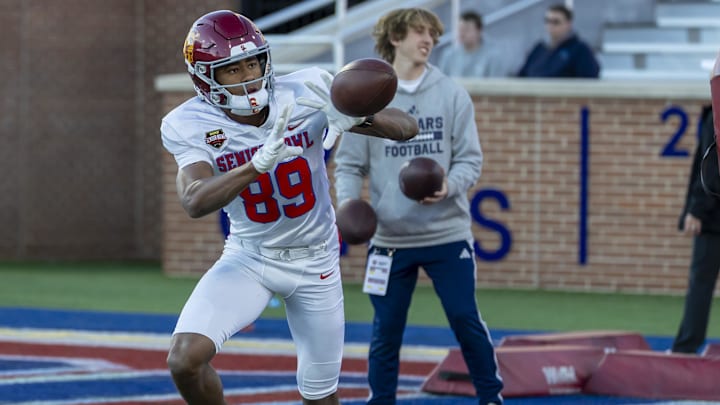 American Team wide receiver Ja'kobi Lane of USC works in passing drills during American Senior Bowl practice.