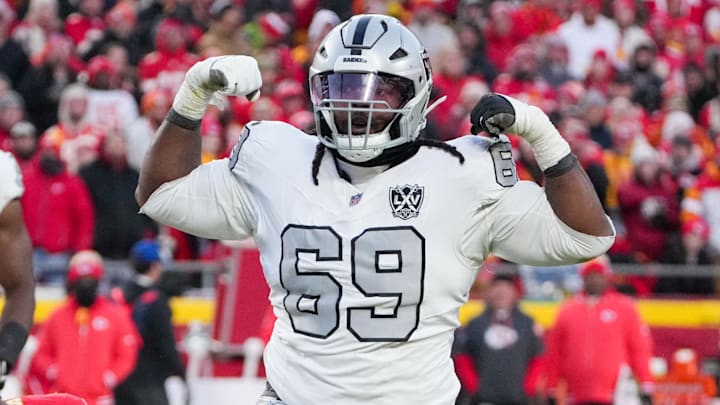 Nov 29, 2024; Kansas City, Missouri, USA; Las Vegas Raiders defensive tackle Adam Butler (69) celebrates after making a sack against the Kansas City Chiefs during the second half at GEHA Field at Arrowhead Stadium. Mandatory Credit: Denny Medley-Imagn Images Nov 29, 2024; Kansas City, Missouri, USA; Las Vegas Raiders defensive tackle Adam Butler (69) celebrates after making a sack against the Kansas City Chiefs during the second half at GEHA Field at Arrowhead Stadium. Mandatory Credit: Denny Medley-Imagn Images