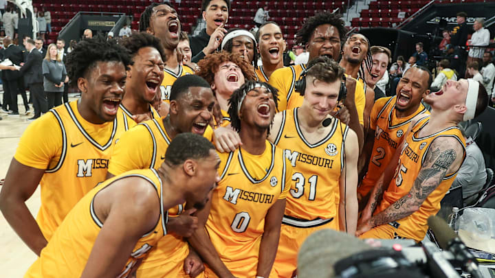 Feb 1, 2025; Starkville, Mississippi, USA; Missouri Tigers team celebrate after winning the game against Mississippi State Bulldogs at Humphrey Coliseum. Mandatory Credit: Wesley Hale-Imagn Images