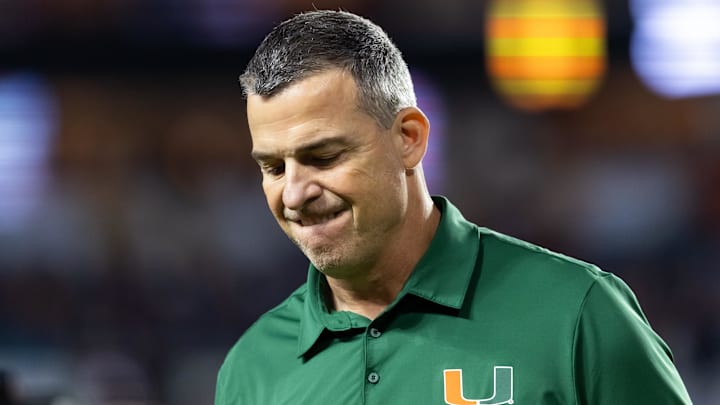 Jan 19, 2026; Miami Gardens, FL, USA; Miami Hurricanes head coach Mario Cristobal reacts against the Indiana Hoosiers during the College Football Playoff National Championship game at Hard Rock Stadium. Mandatory Credit: Mark J. Rebilas-Imagn Images