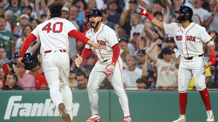 Jun 28, 2026; Boston, Massachusetts, USA; Boston Red Sox right fielder Wilyer Abreu (52) celebrates with Boston Red Sox first baseman Willson Contreras (40) after scoring during the during the fourth inning against the New York Yankees at Fenway Park. Mandatory Credit: Paul Rutherford-Imagn Images