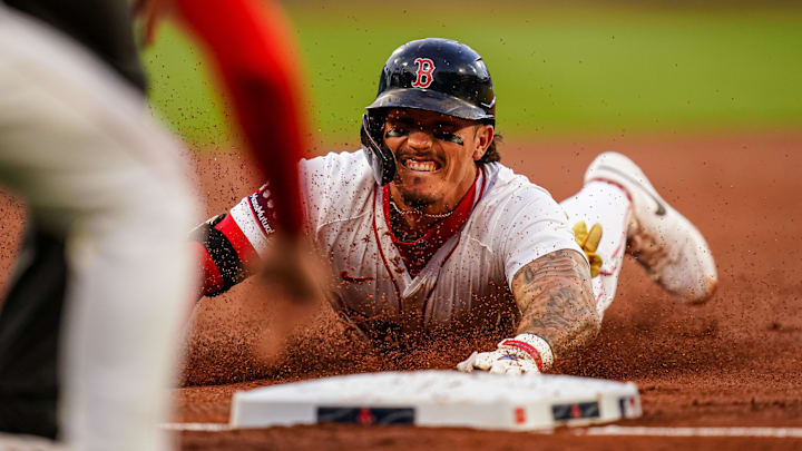 Apr 22, 2025; Boston, Massachusetts, USA; Boston Red Sox outfielder Jarren Duran (16) slides into third base for a triple against the Seattle Mariners in the first inning at Fenway Park. Mandatory Credit: David Butler II-Imagn Images Apr 22, 2025; Boston, Massachusetts, USA; Boston Red Sox outfielder Jarren Duran (16) slides into third base for a triple against the Seattle Mariners in the first inning at Fenway Park. Mandatory Credit: David Butler II-Imagn Images