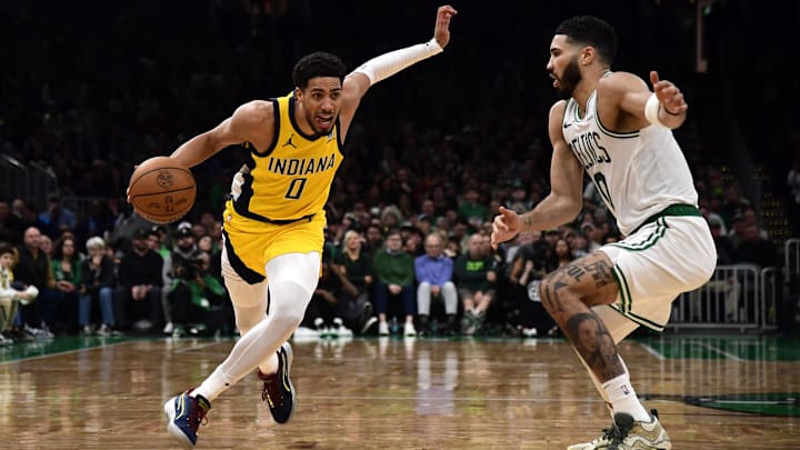 Dec 29, 2024; Boston, Massachusetts, USA; Indiana Pacers guard Tyrese Haliburton (0) controls the ball while Boston Celtics forward Jayson Tatum (0) defends during the second half at TD Garden. Mandatory Credit: Bob DeChiara-Imagn Images Dec 29, 2024; Boston, Massachusetts, USA; Indiana Pacers guard Tyrese Haliburton (0) controls the ball while Boston Celtics forward Jayson Tatum (0) defends during the second half at TD Garden. Mandatory Credit: Bob DeChiara-Imagn Images