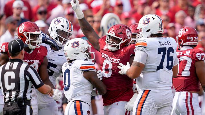 Oklahoma Sooners defensive lineman David Stone (0) celebrates between Auburn Tigers running back Damari Alston (0) and offensive lineman Mason Murphy (76) during a college football game between the University of Oklahoma Sooners (OU) and the Auburn Tigers at Gaylord Family Ð Oklahoma Memorial Stadium in Norman, Okla., Saturday,Sept. 20, 2025. Oklahoma won 24-17.