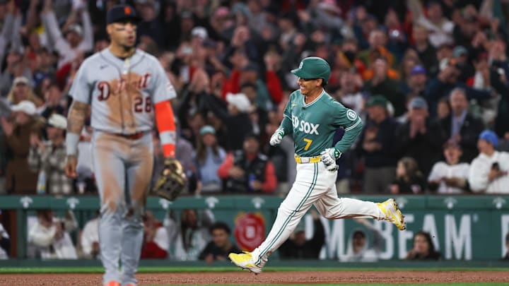 Apr 17, 2026; Boston, Massachusetts, USA; Boston Red Sox pinch hitter Masataka Yoshida (7) celebrates after hitting an RBI during the tenth inning against the Detroit Tigers at Fenway Park. Mandatory Credit: Paul Rutherford-Imagn Images