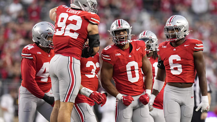 Sep 7, 2024; Columbus, Ohio, USA;  Ohio State Buckeyes linebacker Cody Simon (0) celebrates with teammates after a sack against the Western Michigan Broncos during the first half at Ohio Stadium. Mandatory Credit: Adam Cairns-Imagn Images