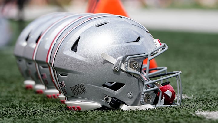 Sep 2, 2023; Bloomington, Indiana, USA; Ohio State Buckeyes helmets sit on the sideline prior to the NCAA football game at Indiana University Memorial Stadium. Ohio State won 23-3.