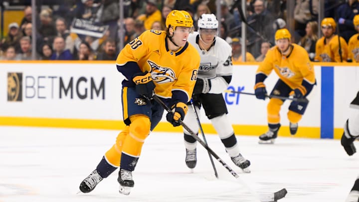 Dec 21, 2024; Nashville, Tennessee, USA;  Nashville Predators left wing Zachary L'Heureux (68) skates with the puck against the Los Angeles Kings during the third period at Bridgestone Arena. Mandatory Credit: Steve Roberts-Imagn Images