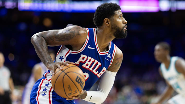 Nov 10, 2024; Philadelphia, Pennsylvania, USA; Philadelphia 76ers forward Paul George (8) controls the ball against the Charlotte Hornets during the fourth quarter at Wells Fargo Center. Mandatory Credit: Bill Streicher-Imagn Images