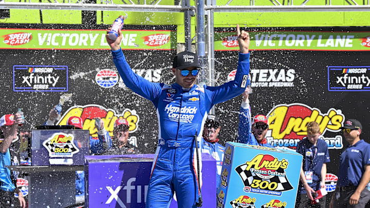 May 3, 2025; Fort Worth, Texas, USA; NASCAR Xfinity Series driver Kyle Larson (88) celebrates in Victory Lane after he wins the NASCAR Xfinity race at Texas Motor Speedway. Mandatory Credit: Jerome Miron-Imagn Images