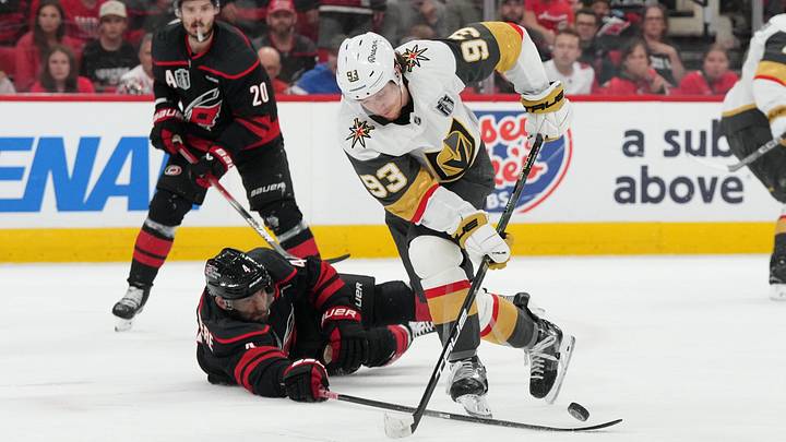 Jun 11, 2026; Raleigh, North Carolina, USA; Vegas Golden Knights right wing Mitch Marner (93) carries the puck against Carolina Hurricanes defenseman Shayne Gostisbehere (4) during the second period in game five of the 2026 Stanley Cup Final at Lenovo Center. Mandatory Credit: James Guillory-Imagn Images Jun 11, 2026; Raleigh, North Carolina, USA; Vegas Golden Knights right wing Mitch Marner (93) carries the puck against Carolina Hurricanes defenseman Shayne Gostisbehere (4) during the second period in game five of the 2026 Stanley Cup Final at Lenovo Center. Mandatory Credit: James Guillory-Imagn Images