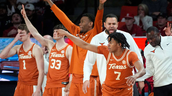 Texas' Simeon Wilcher (7) celebrates a 3-point basket in the second half of the men's college basketball game between the Oklahoma Sooners and the Texas Longhorns at Lloyd Noble Center in Norman, Okla., Saturday Jan. 31, 2026.
