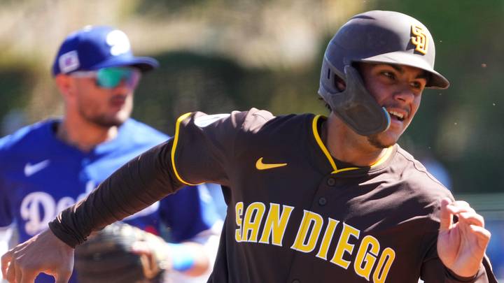 San Diego Padres catcher Ethan Salas (90) rounds third base and scores a run against the Los Angeles Dodgers during the second inning at Camelback Ranch-Glendale on Feb. 23, 2025.