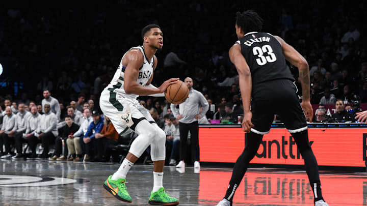 Milwaukee Bucks forward Giannis Antetokounmpo shoots the ball over Brooklyn Nets center Nic Claxton. Milwaukee Bucks forward Giannis Antetokounmpo shoots the ball over Brooklyn Nets center Nic Claxton.